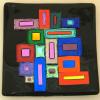 GEOMETRIC EXTROVERT # 102
Fused and slumped black sushi dish with dichroic onlay.  Measures 8 inches square.  $235.  SOLD