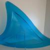 BLUE SHARK FIN:
Fused glass dish in irridescent blue. Measures 21Lx16Wx2D.  $260. Also available in clear for $225.