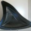 SHARK FIN:
Fused glass dish in "gun metal" grey. Measures 21Lx16Wx2D. $285. Also available in clear for $225.