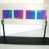 4 BOXES:
Kiln formed cast glass block with dichroic inlay, cold worked, sand-blasted edges and 2 surface windows. Displayed on custom black metal stand. Measures 16Lx6.5Hx1W. Contact me for pricing.  SOLD