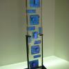 GEOMETRY:
Kiln cast glass tower with dichroic inlay. Cold worked and sand-blasted. Displayed in custom black metal stand.  Measures 24Hx4.5Lx1.25W. SOLD