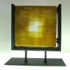 THE LIGHT:
Kiln cast glass sculptural  block. Cold worked and sand-blasted.  Displayed in custom black metal stand. Measures 8x8x2 inches thick. Contact me for pricing.