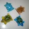 Turtles:
Cast glass turtles. Measure 3Lx2W. Available in a variety of colors. $15 each