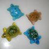 Turtles:
Cast glass turtles. Measure 3Lx2W. Available in a variety of colors. 
