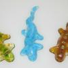 Salamanders:
Cast glass salamanders. Measure 5Lx2W. Available in a variety of colors. $15 each