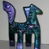 LILAC:
From Sofia's Herd, a fused glass pony named Lilac with a  black irridized body and dichroic elements. Measures 7.5Hx5.5W. $125