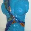Male Torso in Blue:
  Fused and slumped glass torso wall sculpture with dichroic embellishment.  Measures 25Lx17.5H.  Wall mounted via stand off/bracket system for easy installation.  SOLD