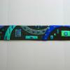FIRESTICK #148    :
Fused glass art with dichroic onlay. Wall mounted via stand-off bracket system that is easy to install.  May be hung horizontally or vertically. Measures 36 x 6 inches.  SOLD