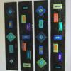 Fused glass wall art with dichroic onlay.  Wall mounted via stand off bracket system.    Each piece measures 35x7 inches.  May be hung horizontally or vertically.  From left to right, pieces are named GEO Firestick #114, #115, #116, #117.  Contact me for pricing.  May be sold individually.  